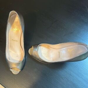 Christian Louboutin gold heels. Beautiful. Size 9